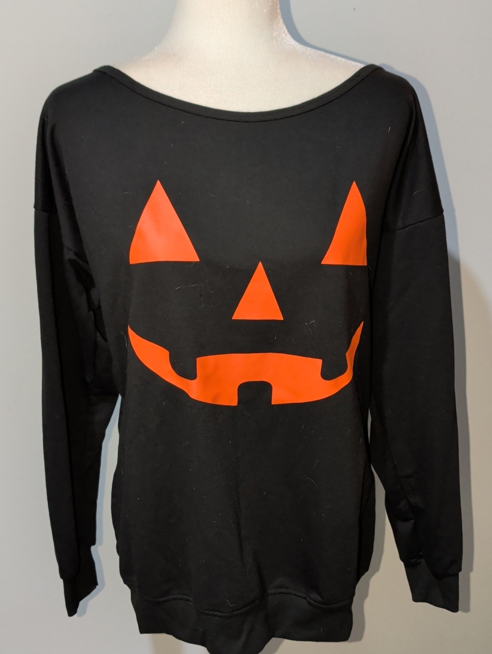 Women's Black Halloween Jack-O'-Lantern Off-The Shoulder Sweatshirt